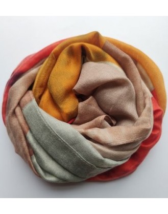 Scarf in the colors burnt orange, red, yellow, brown and gray 